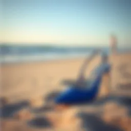 Elegant blue summer shoes on a sandy beach