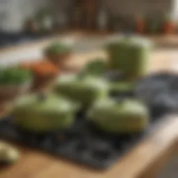 Elegant avocado green cookware set on a rustic kitchen countertop